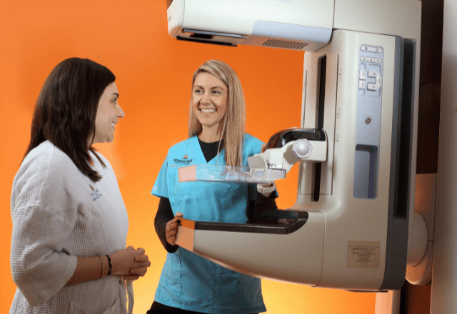 Providers preparing to perform a mammogram breast exam procedure